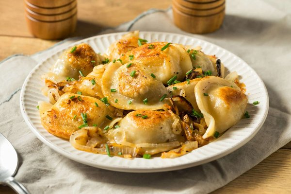 How do you prepare a traditional Polish pierogi with potato and cheese filling?