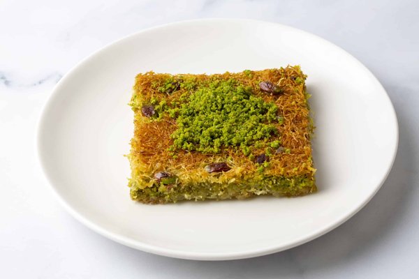 What's the key to a flavorful and hearty sausage and kale Zuppa Toscana?